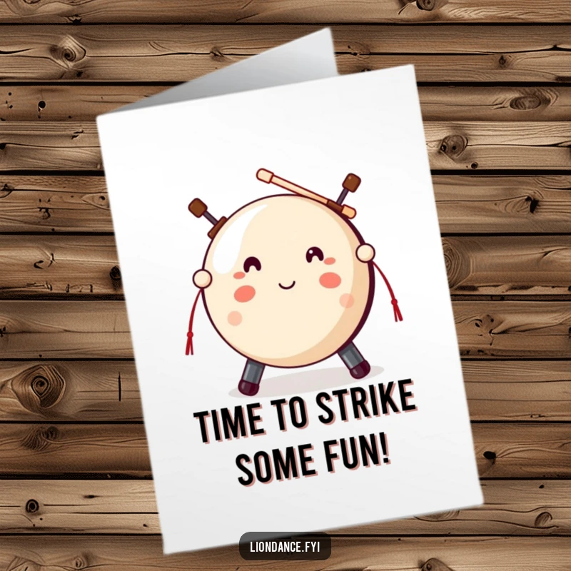 Funny Free Printable Birthday Card: A cute gong prop with mallets poised, ready for a festive birthday strike.